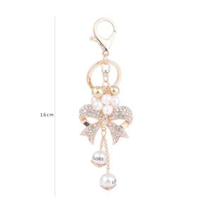 Creative Exquisite New Alloy Bow-shaped Keychain with Pearl String Full Diamonds Girls Car <b>Key</b> <b>Chain</b> for Mother's Day Gift - Product Image 6