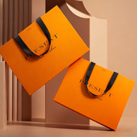 Sacs en papier de luxe pour la vente au détail de vêtements, de cadeaux, de bijoux, avec poignée, personnalisés avec le logo de la marque, pour la promotion