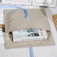 Pochette en jute beige en gros pour vêtements, écharpes, livres, avec ruban, logo personnalisé imprimé, sac cadeau en jute pour emballage