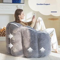 Fauteuil paresseux compact moderne et minimaliste en tissu, rempli de mousse, idéal pour les petits appartements et chambres à coucher