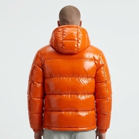 Veste d'hiver décontractée coupe classique couleur unie orange à capuche matelassée coupe-vent avec fermeture éclair et rembourrage en duvet unisexe