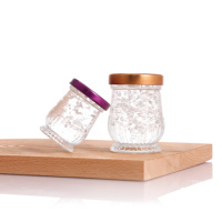 Nouveau modèle OEM Pot à confiture de miel Bocal en verre pour le stockage des aliments Préserver le miel Bocal en verre de 50 ml 75 ml 100 ml avec couvercles