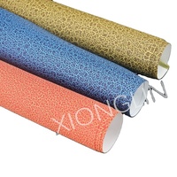 Dongguan Xionglin fabrica rollos de película de TPU de alta calidad para la parte superior de calzado deportivo.