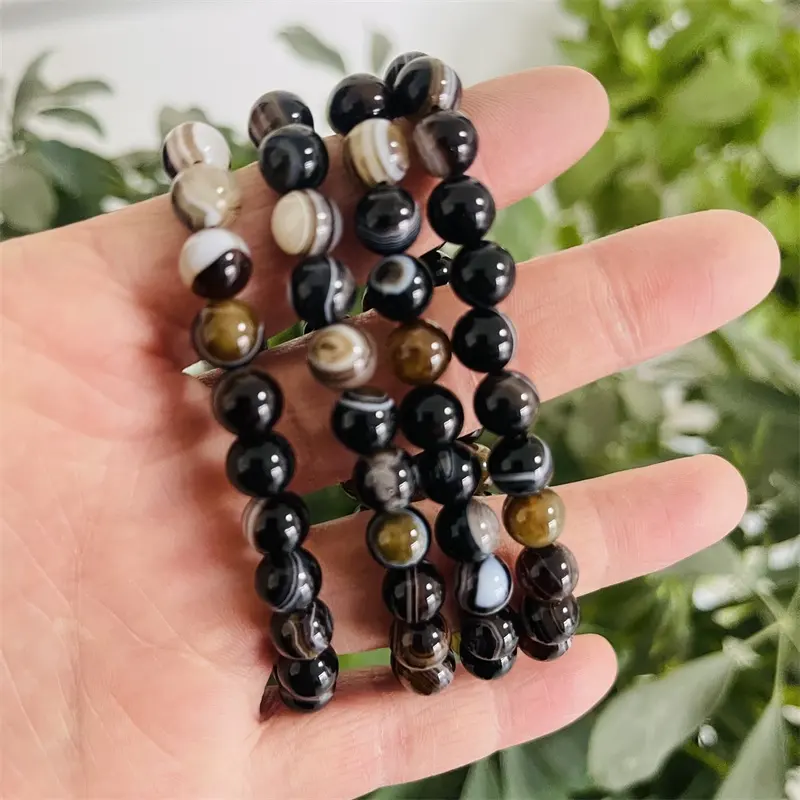 Natürliche hochwertige spirituell polierte schwarze Achat-Kristall-Perlen-Schnitzerei beliebte Kristall-Armbänder