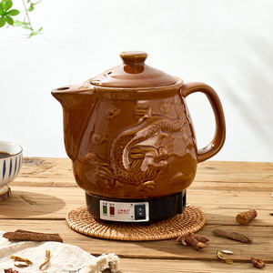Usine en gros vente chaude <span class=keywords><strong>électrique</strong></span> automatique <span class=keywords><strong>d</strong></span>écoction chinois médecine traditionnelle à base de plantes en céramique santé Pot Cooker - Product Image 1