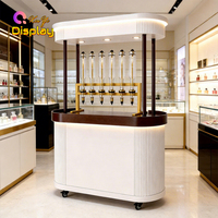 XINYI Station d'expérimentation olfactive de luxe moderne, suspendue, en acier inoxydable et MDF, avec éclairage LED, écologique et personnalisable pour boutique