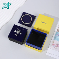 Boîte de présentation A1 de luxe en papier jaune et bleu vif avec coussin en peluche, vente en gros B2B, personnalisation du couvercle supérieur et inférieur, affichage de la marque