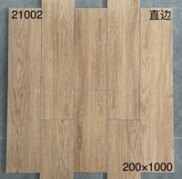 Carreaux de sol en céramique de style bois massif 200x1000mm, disponibles pour revêtements de sol et murs, idéaux pour les intérieurs de villas et les murs en briques.