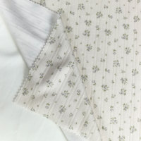 Tissu floral ajouré personnalisé 96,5 % polyester 3,5 % élasthanne 220 GSM en jersey côtelé pour pyjamas et textiles de maison