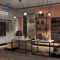 Meubles de magasin de détail, présentoirs de vêtements, éclairage LED pour magasin de vêtements, design d'intérieur, îlot de présentation pour magasin de vêtements de marque