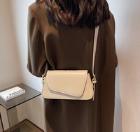 2025 Alibaba moda dama moderno PU cuero bolso compras en línea, nuevo diseño mujer mini bolso cubo bandolera OEM