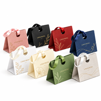 Sac cadeau en carton personnalisé avec logo, poignée en ruban de satin tressé, découpe ronde, pour bijoux et parfums, vente en gros