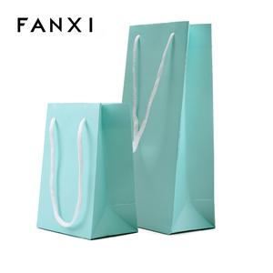 โรงงานผลิตกระเป๋าถือกระดาษลายหนังสีเขียวแบบกำหนดเองจาก FANXI ประเทศจีน สำหรับบรรจุภัณฑ์เครื่องประดับและของขวัญ - Product Image 2