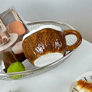 Design <span class=keywords><strong>original</strong></span> en céramique avancée en forme <span class=keywords><strong>de</strong></span> noix <span class=keywords><strong>de</strong></span> <span class=keywords><strong>coco</strong></span> pour le petit déjeuner Tasse à lait frappé 250ml Thé <span class=keywords><strong>de</strong></span> l'après-midi Tasse à café pour couple - Product Image 1