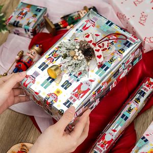 Papel de Regalo Navideño con Diseño de Cascanueces y Bastones de Caramelo, Reversible, 17 Pulgadas x 32.8 Pies, para Envolver Regalos y Manualidades - Product Image 3