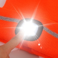 Gorro de gorro con luz LED portátil al por mayor, lámpara de gorro nueva con iluminación LED reflectante y gorros con modo de alarma intermitente