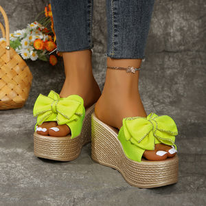 Nouvelles sandales compensées d'été grande taille 701 pour femmes avec nœud et semelle épaisse, style claquettes à plateforme, vente en gros transfrontalière - Product Image 1