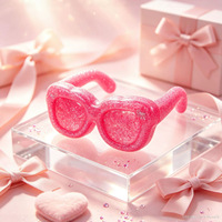 Nouveauté 2026, Jouet à presser anti-stress souple à rebond lent, design tendance et cool, en forme de lunettes rose pailleté Vaseline, pour le marché international