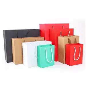 Wholesale Custom Logo Printed Craft Gift Clothing Cosmetic Packaging Paper Shopping Bag With Handle