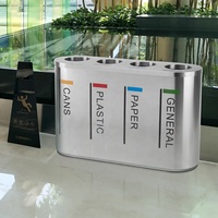 Poubelle de recyclage ovale en acier inoxydable 84L à 4 compartiments, avec code couleur, pour aires publiques d'aéroport