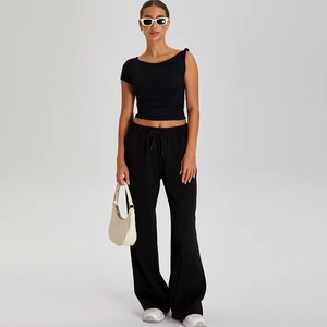 ชุดโยคะออกกำลังกายผู้หญิง 2 ชิ้น ขายดี เอวกลาง ระบายเหงื่อได้ดี ทนทาน กางเกงลำลอง เสื้อครอปท็อป ไซส์ใหญ่ มีเชือกผูก - Product Image 4