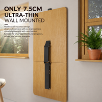 Support mural ultra-fin pour table pliante, avec amortissement doux et système de levage.