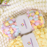 Vente chaude taille moyenne 16mm couleurs fantaisie pompons 100% Polyester pop-corn pompon fils pour couverture tricot