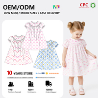 Robe à volants imprimée nœud rose pour bébés filles, vente en gros, fabricant OEM ODM, robes en coton tissé smockées pour enfants filles