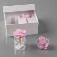 Bouteille ronde en verre de 50ml parfumée porcelaine fleur arôme plâtre désodorisant maison céramique parfum huile roseau diffuseur vente en gros