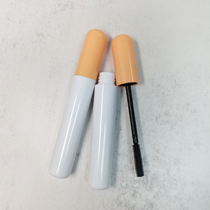 Vente en gros de contenants de mascara cylindriques brillants en ABS/PETG avec couvercle orange, tube à cils vide, emballage cosmétique personnalisé - Product Image 6