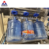 Ligne de production automatique 19 20 litres Embouteillage d'eau Lavage Bouchonnage Machine de remplissage d'eau en bouteille de 5 gallons
