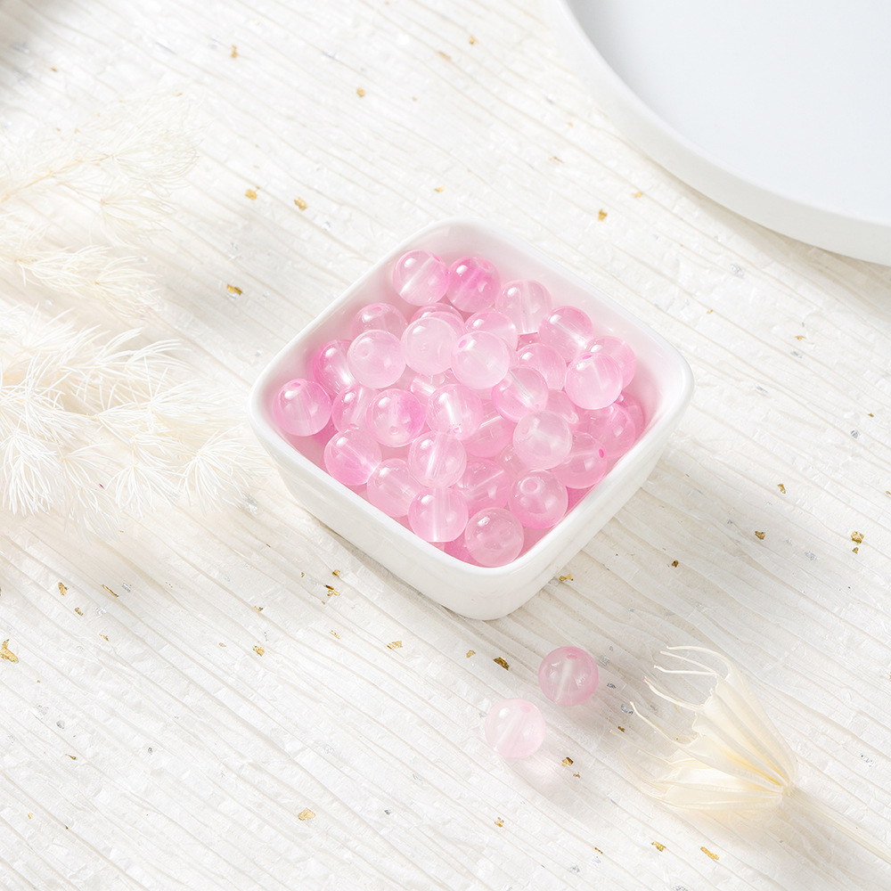 Perles de verre bicolores - rose et blanc
