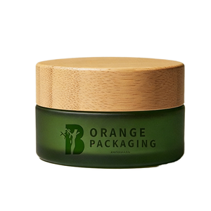 Pot en verre dépoli vert avec couvercle en bambou, emballage orange, écologique, pour lotion et cosmétiques, étiquette Guangdong, produit très vendu - Product Image 1