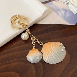 Wholesale Colorful Gradient Shell Creative Pearl Keychain, Bag Hanger, Fashion <b>Accessory</b>,Trendy Women's Keyring - Product Image 3