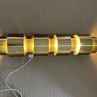 Applique murale LED cylindrique moderne en laiton brossé, tube doré, culot E26, lumière blanc chaud doux 2700K, abat-jour métallique pour couloir d'hôtel et escalier