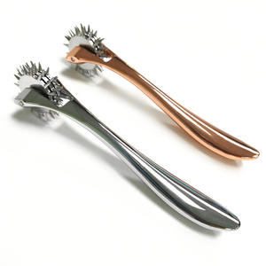 Masseur intime à rouleaux avec accessoires métalliques pour une stimulation intime et une expérience agréable pour adultes - Product Image 6