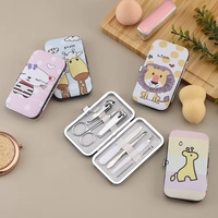 Kit de coupe-ongles portable classique 7 en 1 en acier inoxydable avec motif de dessin animé, boîte de couleur et logo personnalisé