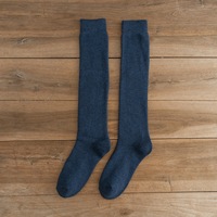 Vente en gros de chaussettes pour hommes Chaussettes longues tube épaisses pour l'hiver à mollet Chaussettes hautes chaudes et moelleuses pour hommes Bas à boucle