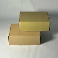 Boîte d'expédition en carton ondulé personnalisée en gros pour l'emballage de bougies, avec impression en relief, design durable, matériaux recyclés, noir