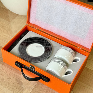 Hot Sale European Luxury <b>black</b> and white Circle Porcelain Tea Cup & Saucer Set With exquisite <b>gift</b> <b>box</b> for friend - Product Image 1