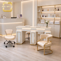 Table de manucure de luxe avec armoire de rangement multi-compartiments et trou pour câbles réservé pour studio de manucure commercial