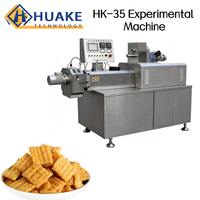 Extrudeuse industrielle à double vis en acier inoxydable pour la production de produits alimentaires sur ligne de transformation