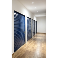 Système de stockage en acier avec porte enroulable bleue, verrouillable, résistant à la corrosion, pour entrepôt et atelier intérieur en tôle ondulée