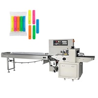 Machine d'emballage horizontale haute efficacité pour articles de papeterie (stylos, règles) avec scellage de fin de série haute précision et changement de taille facile