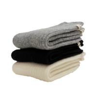 Chaussettes mi-mollet douces et confortables en mélange de laine pour femme, avec étiquette décorative, idéales pour l'hiver, vente en gros personnalisée