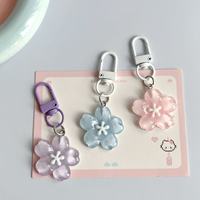 Porte-clés romantique en gelée motif fleur de cerisier, mignon et féminin, en résine plastique translucide, breloque de sac à motif de pétales de fleurs, pour couple et meilleure amie