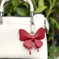 Porte-clés papillon en cuir PU double couche coloré et tendance avec fermoir métallique, cadeau promotionnel, breloques pour sacs femme
