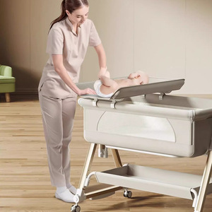 Cuna Portátil Plegable Multifuncional, Mesa de Lactancia, Cama Mecedora, Cambiador de Pañales, 0-12 Meses, Gris Blanco Hueso - Product Image 1