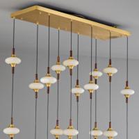 Lustre LED linéaire sculptural multi-pendentifs en laiton et bois de noyer, style Japandi, pour îlot de cuisine, salle à manger, villa, escalier