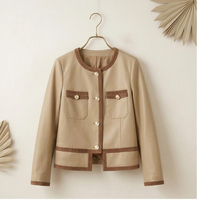 Manteau pour femme en peau d'agneau pleine fleur lisse, fini suède kaki clair, boutons nacrés, veste en cuir élégante
